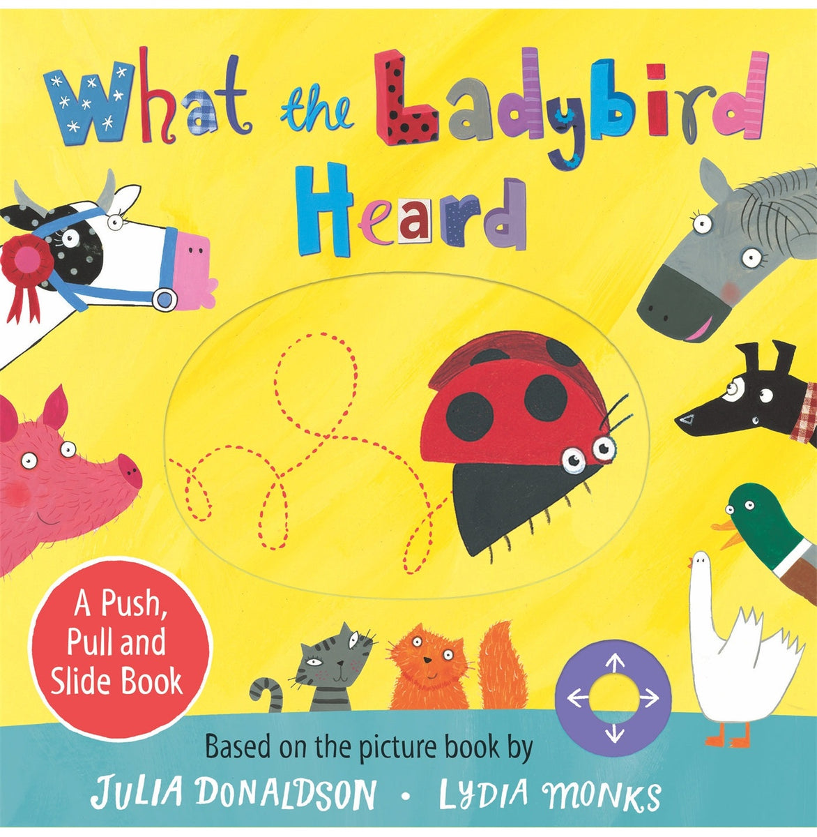 What the Ladybird Heard: A Push Pull and Slide Book Board book Julia