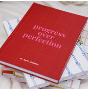 image //www.c...7mm Progress over perfection A5 Notebook Dotted 160 pages