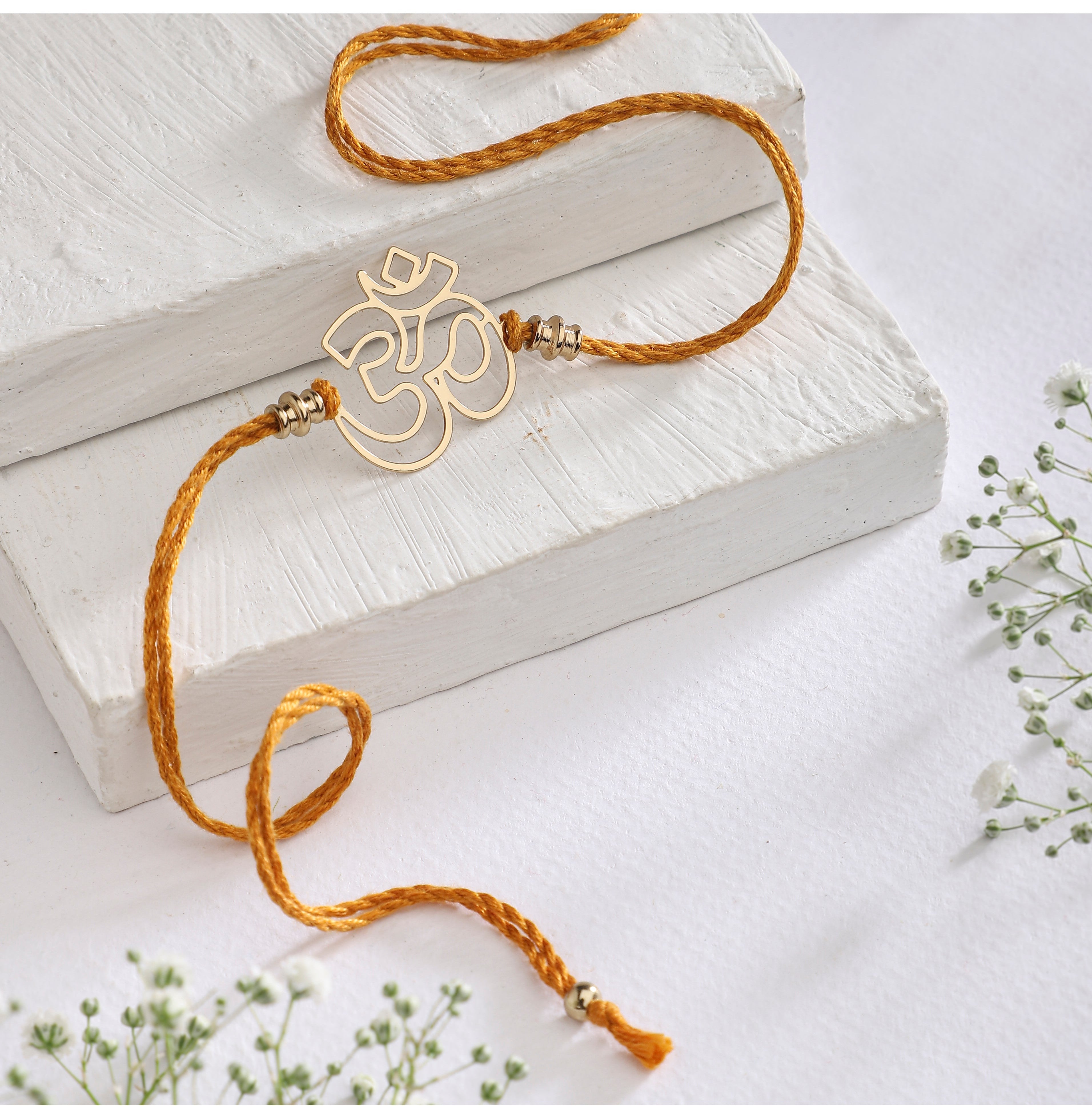 Rakhi Om Mustard: Handcrafted Elegance For Sibling Bonds