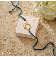 image //www.c...Rakhi Brass Leaf