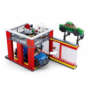 image //www.c...Sluban Town Automobile Sales Service Shop Building Bricks with 3 Mini Toys & 1 Blue Toy Car